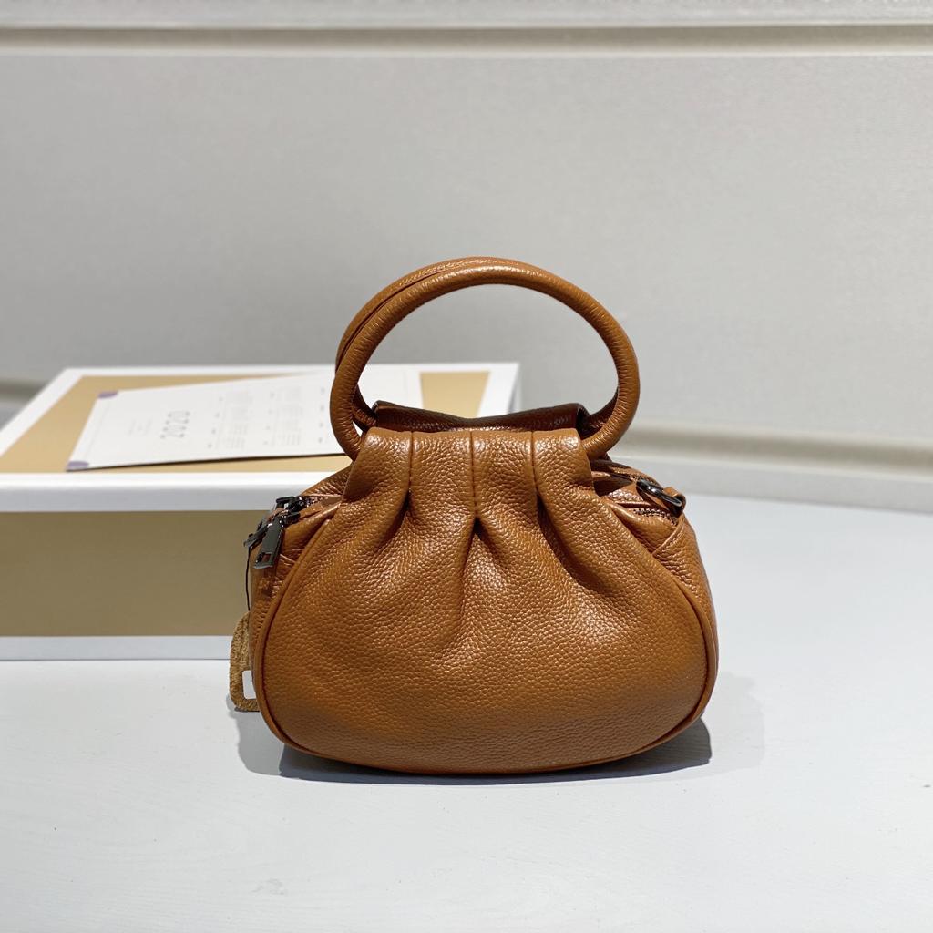Bolsa Feminina de Couro Genuíno 2025 Nova Retrô Couro Bovino Camada Superior Bolsa de Mão Simples Versátil Tote Fabricante