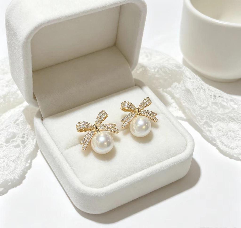 Exquisite Micro-inlaid Zircon Bow Pearl Stud Earrings for Women - Fashionable, Simple, and Versatile