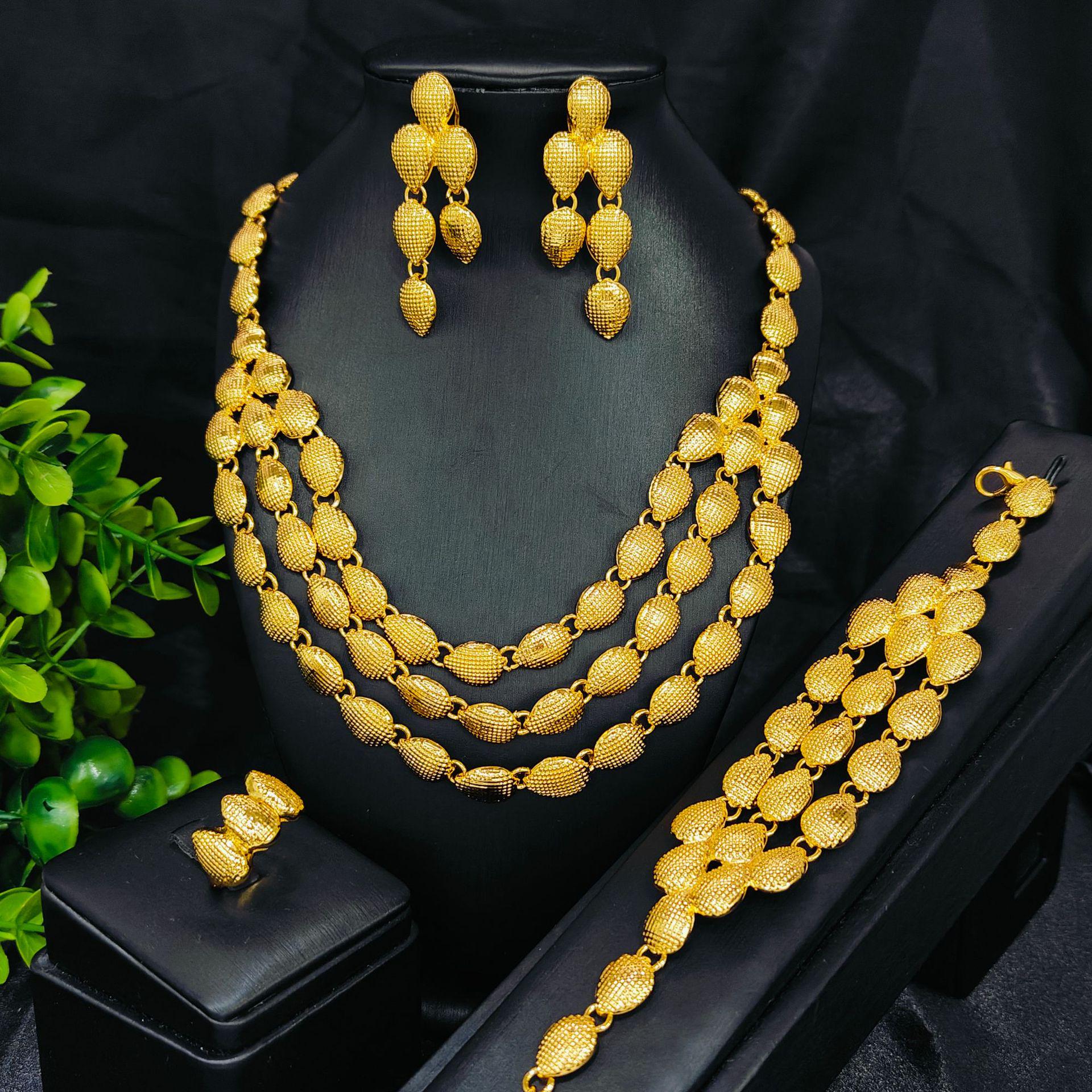 

Gold-Plated Vietnamese Bridal Jewelry Set: Necklace, Earrings, Ring, and Bracelet 24k Gold Plated
