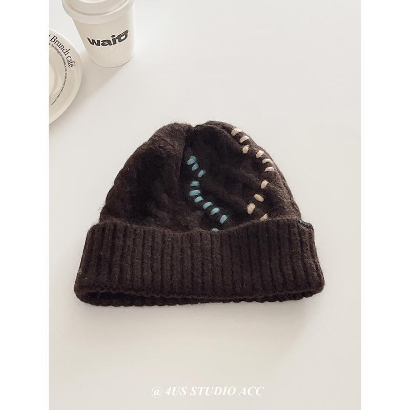 

A Thickened Woolen Knitted Hat with Colorful Twisted and Crocheted Threads for Women To Keep Warm in Winter Makes The Face Look Smaller one size