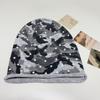 Autumn and winter new European and American camouflage jacquard knitted hat men's and women's thermal hats personalized hip-hop cold hats versatile f