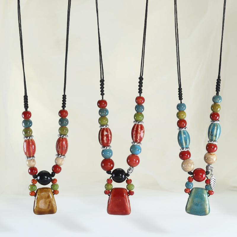 Ceramic axe pendant, long necklace, retro simple and versatile sweater chain.