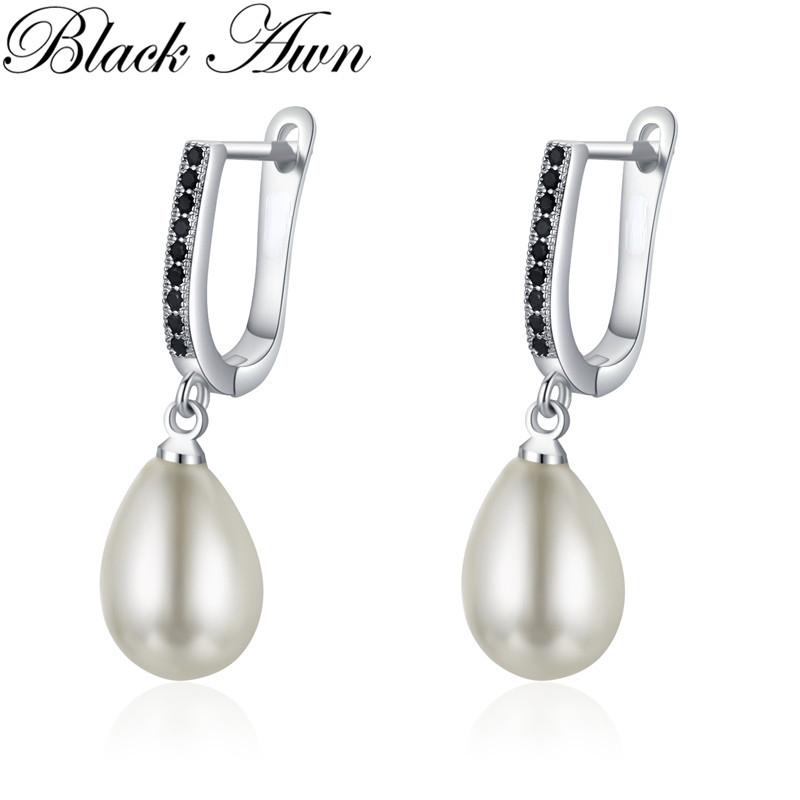 

Чорна ость. Чорно-білі ювелірні сережки