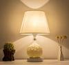 European Style Ceramic Bedside Lamp: Fashionable, Dimmable Night Light with Fabric Shade for Bedroom or Study.