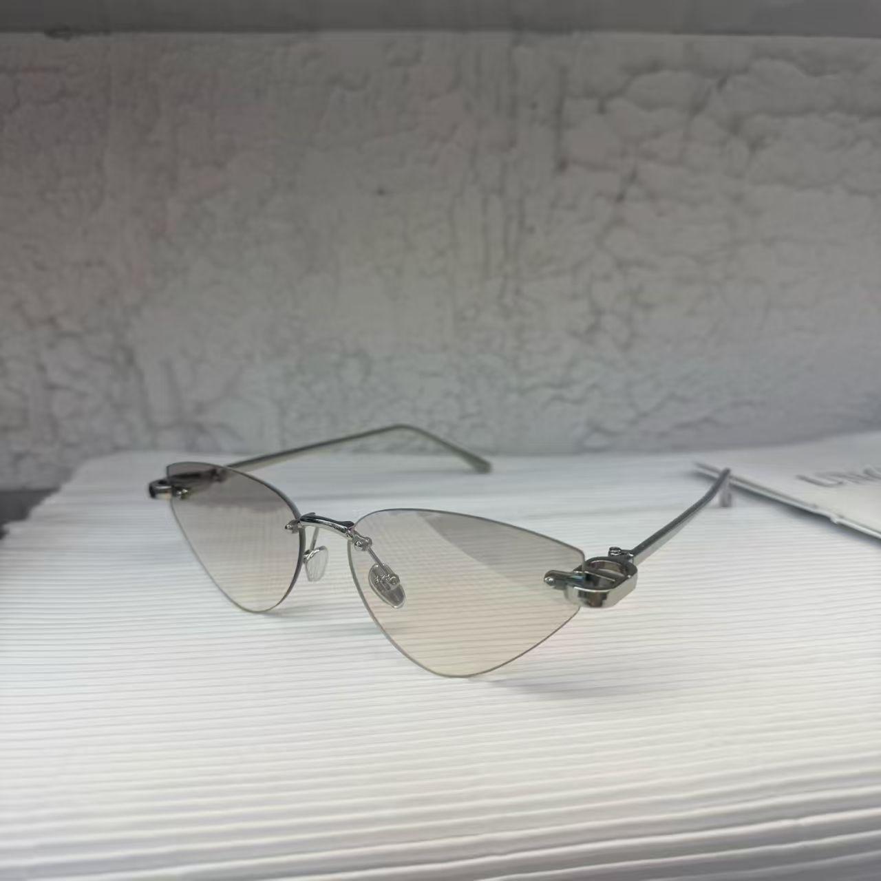 

Cat Eye Shape Woman Sunglasses Rimless UV400 Protection Sun Glasses Man Driving Travelling Women s Sun Glass