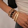 4-teiliges Armbandset mit Leopardenmuster für Damen, goldfarben, glatt, übertrieben, Metall, mehrlagig, täglicher Party-Schmuck-Accessoire