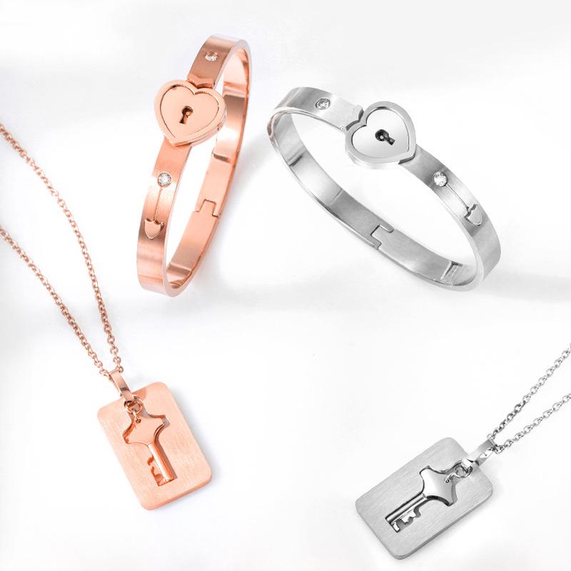 Bracelet Interlock en Acier Titane Style Fala Chen "Triumph in the Skies" pour Couples avec Fermoir Cœur Diamanté