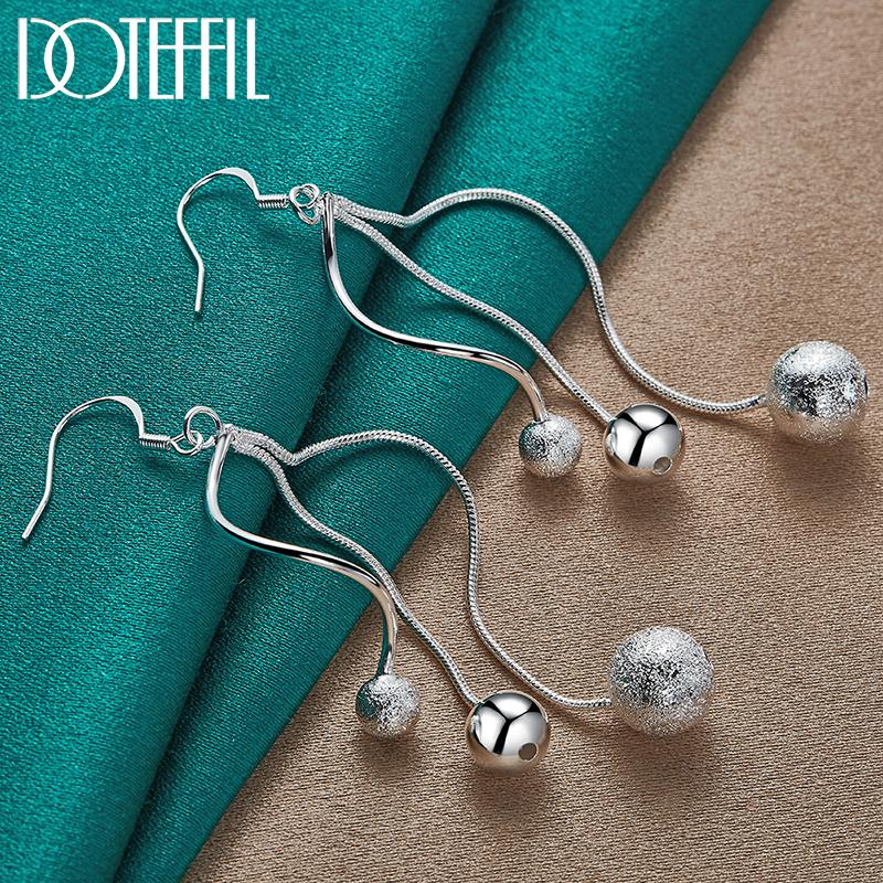 Urocze kolczyki z koralików srebrna biżuteria