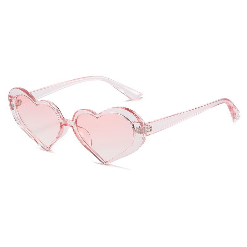 

A Pair Of Cute Girl Candy Colored Heart-Shaped Sunglasses Fashionable And Trendy Peach Heart Ocean Piece Sunglasses