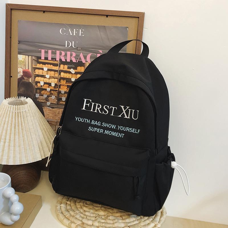 School bag Korean version ins style versatile junior high school student school bag solid color letter backpack high value simple lightweight backpack