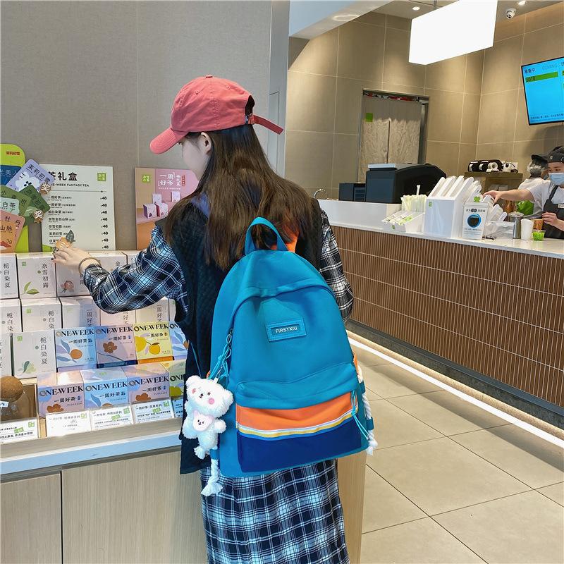 Schoolbag new 1011 winter backpack female original style Japanese simple college style college student trend contrasting color backpack