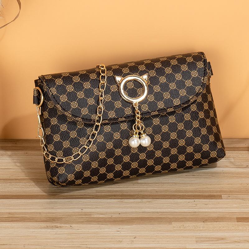 

Ladies bag summer new fashion fresh cat head pearl rhombus shoulder bag messenger bag one piece