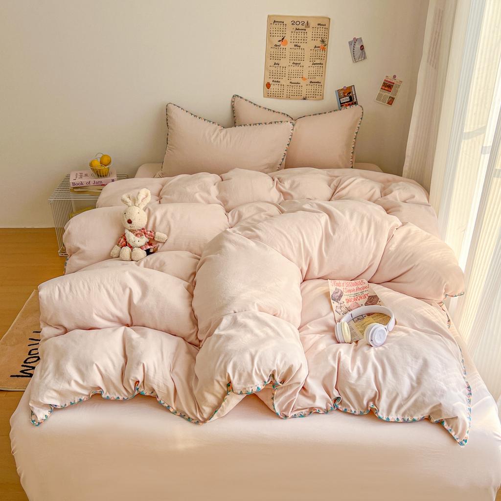 Literie Class A 2025 nouveau vent crème couleur unie drap de lit ensemble quatre pièces housse de couette étudiante ensemble quatre pièces ménage