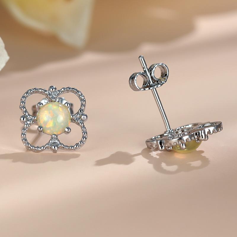 Hot sale Korean version of small fresh four-leaf clover white opal hollow flower stud earrings women's earrings retro ear jewelry
