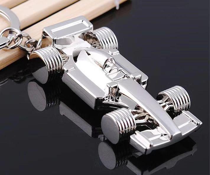 Breloc metalic personalizabil cu camion - Gravare logo pentru cadouri promoționale