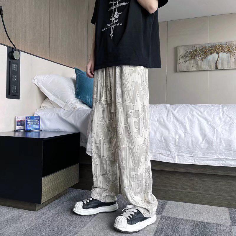 Trendy Corduroy Men's Full-Print Casual Pants: Retro Loose-Fit Straight Trousers for Spring & Autumn