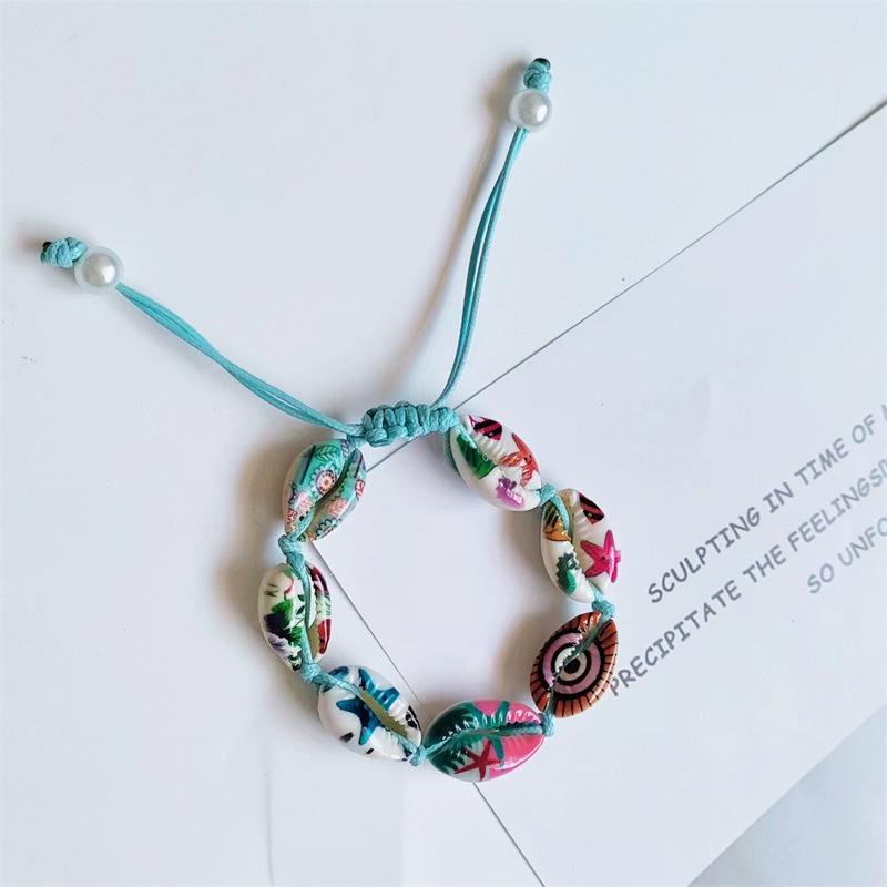 Handmade Bohemian Bracelet with Natural Shell Beads and Waxed Cord