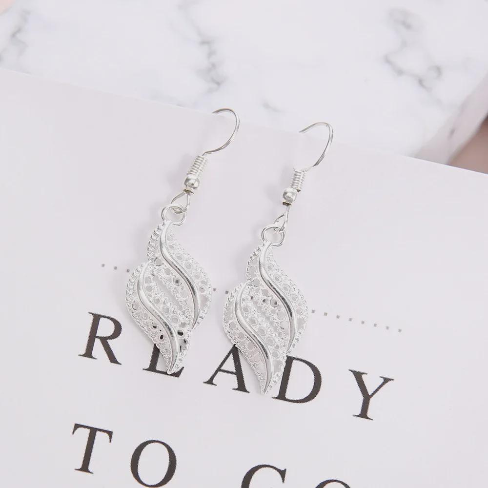 Europäisch-Amerikanische Mode Retro Silberplattierte Hohle Ohrringe für Damen