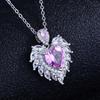 Angel Wing Pendant Necklace with Simulated Aquamarine Heart Wing Jewelry Design for Women