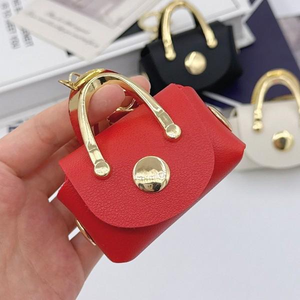 Trendy Keychain Pendant: Stylish Earphone Case, Coin Purse, and Mini Bag Accessory