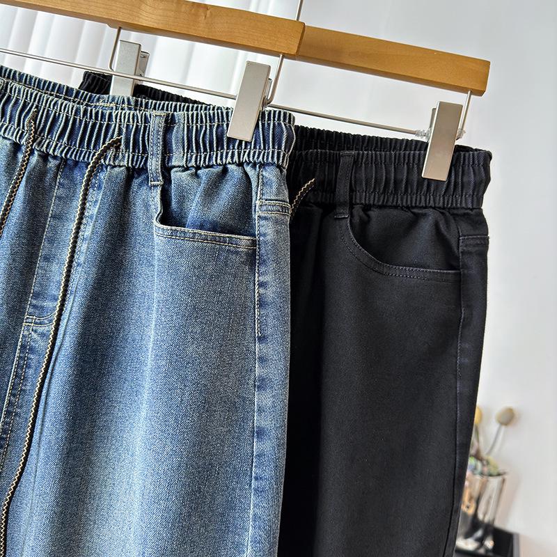 Autumn Women's Plus-Size Denim A-line Skirt with Front Slit, High Stretch, and Slimming Fit