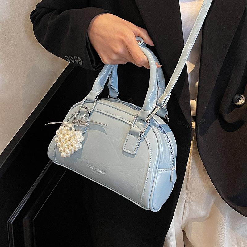 2025 New Product Casual Small Fresh Ou Ruofeng Portable Boston Bag Niche Versatile Commuter Premium Messenger Bag
