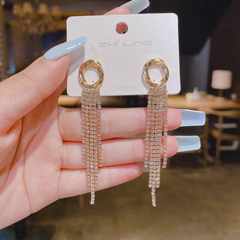 Light luxury high-end sense gold long fringed temperament earrings fashionable atmosphere versatile stud earrings personalized daily earrings