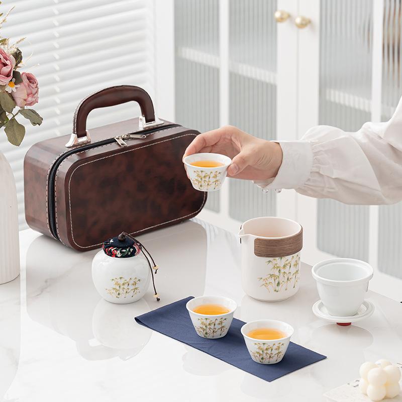 Premium Dehua Weißporzellan Guochao Tinte Set Outdoor Camping Geschäftsreise Teeset Business Gruppenkauf bedrucktes Logo