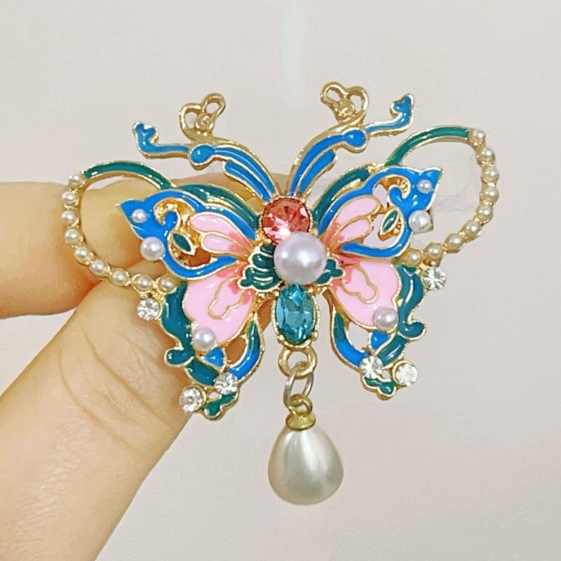 Retro enamel-colored pearl butterfly brooch - High-end, niche-style corsage fastener with anti-glare function, elegant pin.