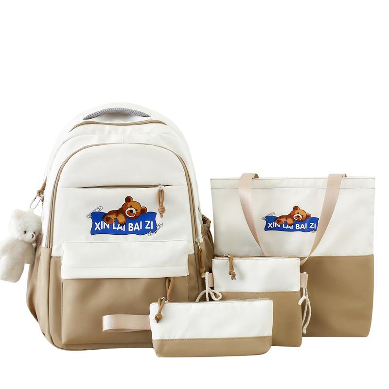 

Шкільний рюкзак із чотирьох предметів. Рюкзак для подорожей для молодших школярів бежевий