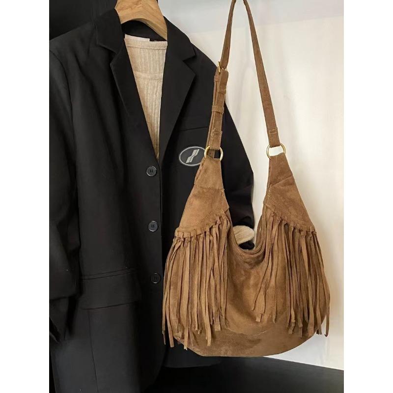 

Premium niche bag women s large capacity 2 new tassel wasteland wind commuter bag Maillard коричневый