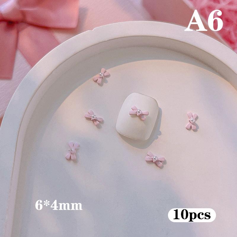 10 Stück Lange Rosa Harz Schleife Nagelkunst Charme 3D Kawaii Mattierte Fee Nagel Schleifen Dekor Teile Diy Design Nagelzubehör
