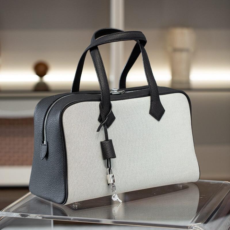 

2025 Новая женская сумка из натуральной кожи, первый слой кожи TC, парусина, Виктория, для отдыха, большая вместимость, сумка через плечо, трансграничная 35x23x15cm чёрный/белый