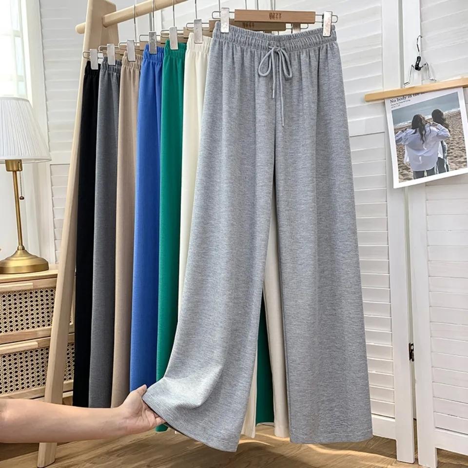 Waflowe elastyczne spodnie z wysokim stanem na co dzień jesienne i zimowe damskie koreański styl luźne drapowane spodnie szerokie nogawki pokaż długość nóg sportowe spodnie do biegania