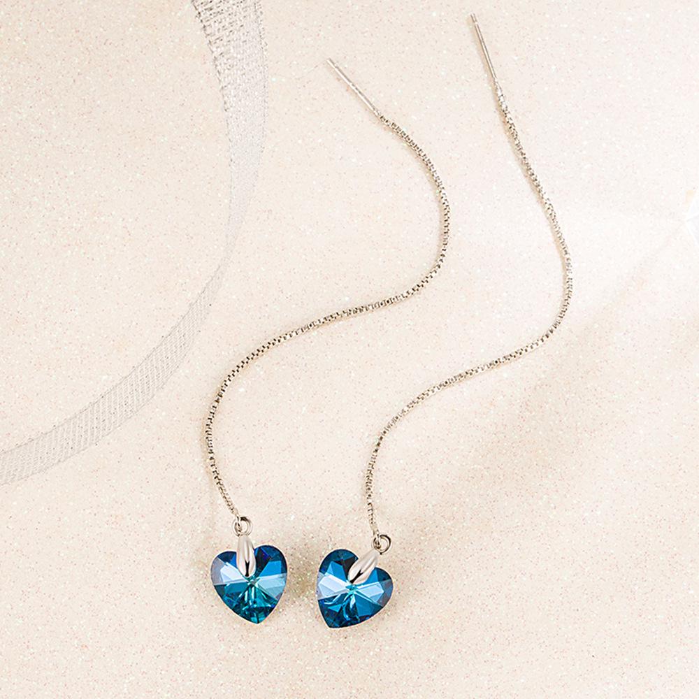 Koreanische Damen Ohrringe mit versilbertem Ozeanherz-Quastenanhänger und blauem Kristall