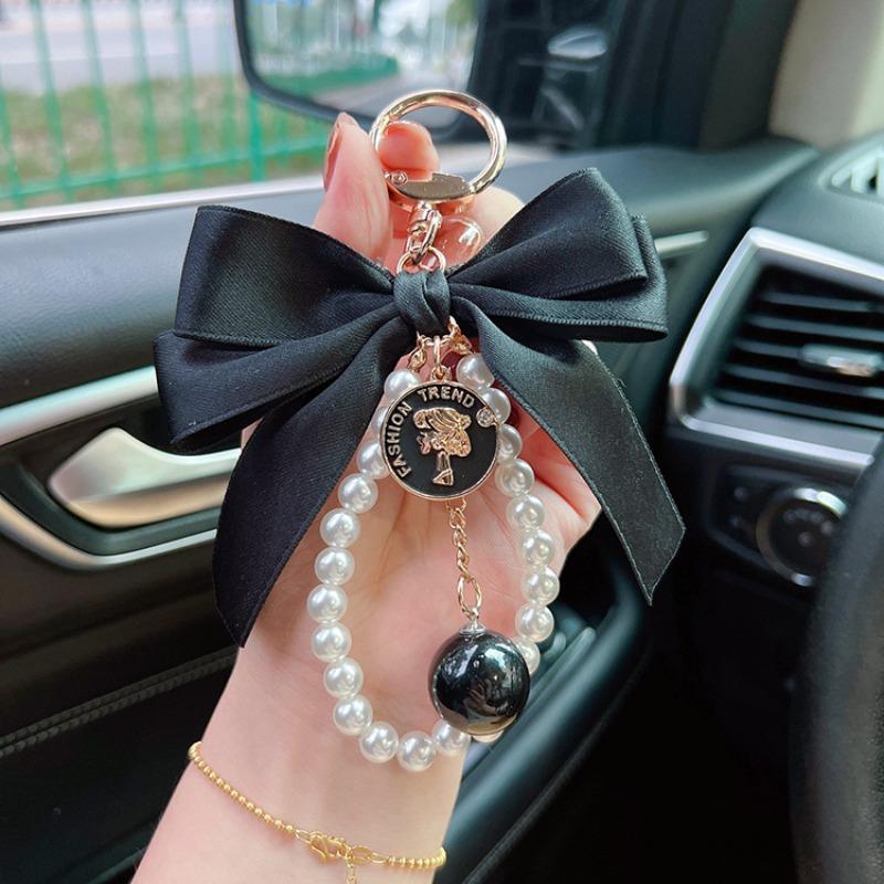 

Fashion Big Bow Tie Key Chain Pearl Chain Women s Car Pendant Statement Tote Hanging Ornament чёрный
