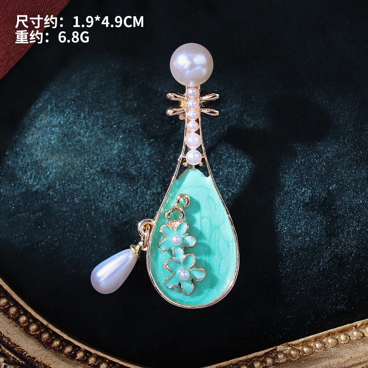 

Китайский ретро-стиль, голубая темпераментная брошь-пипа, креативный универсальный корсаж, высококачественный кулон-чеонгсам, креативная булавка