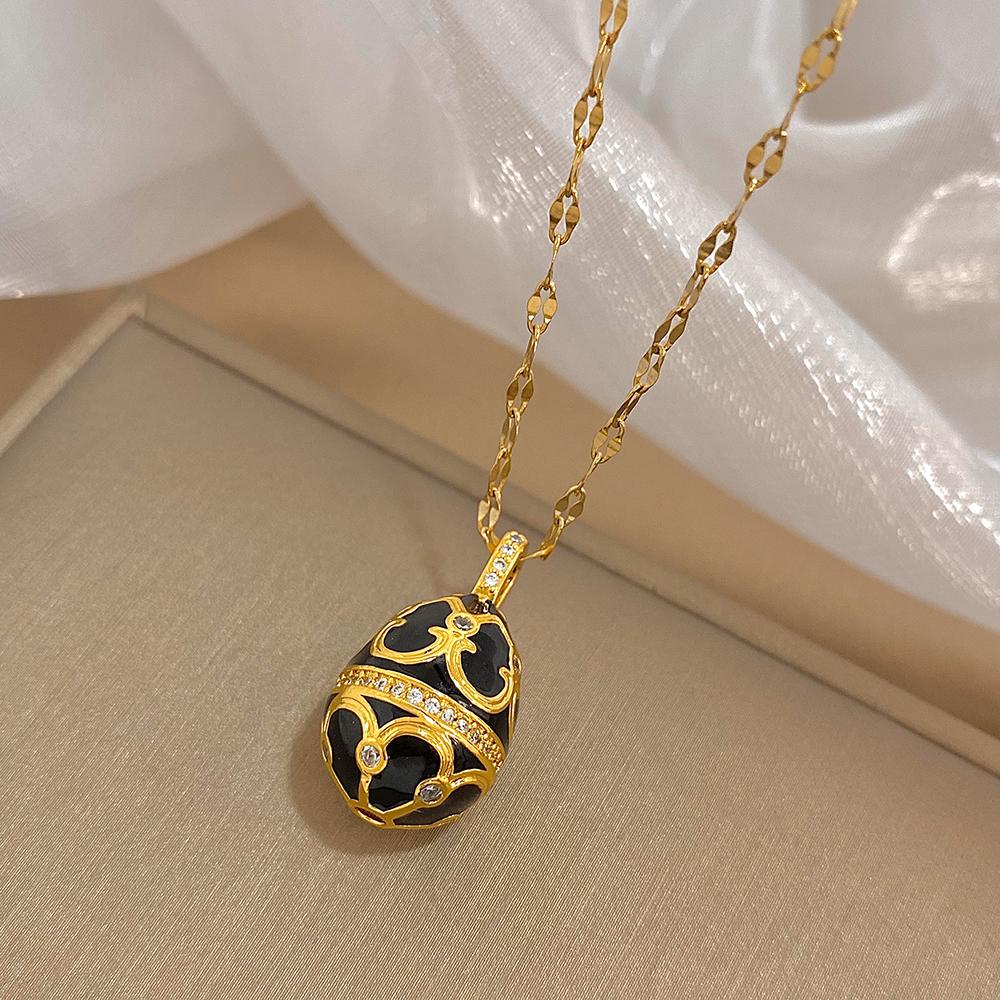 

AENSOA Colorful Enamel Easter Egg Pendant Necklaces for Women Guilloche Locket Egg Rhinestone Charm Necklace Gold Color Jewelry