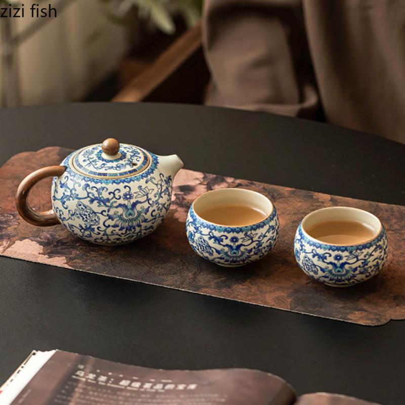 Ru Brennofen Blau Weiß Keramik Teekanne Kreative Teezubereiter Retro Handgefertigte Teekanne Kung Fu Teeset Haushalts-Teegeschirr Tee-Sieb