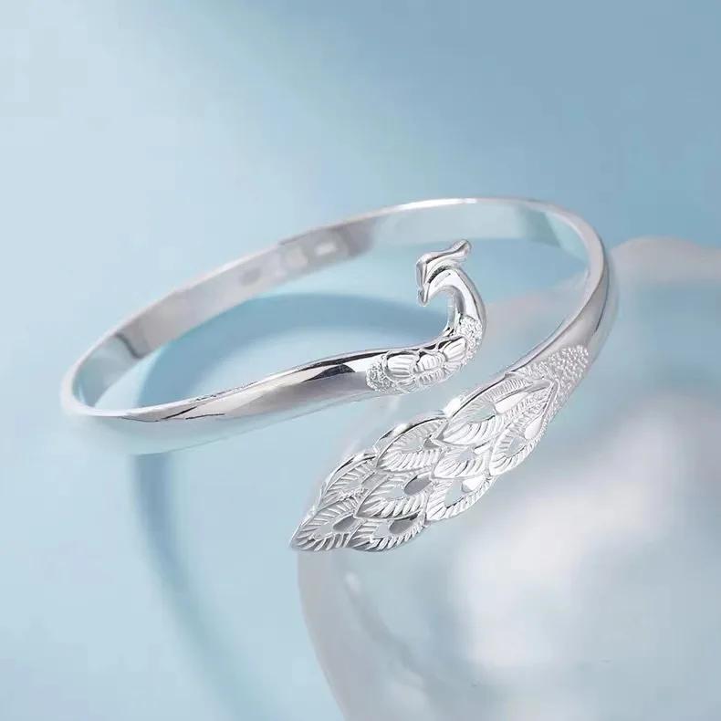 

New Jingtai blue bracelet, ethnic style seven-color peacock oil-dripping women s bracelet