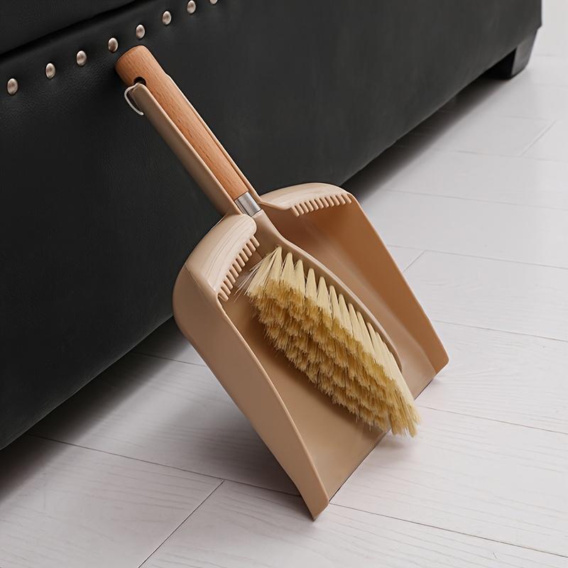 

A set of small dustpan and wooden handle broom combination - suitable for cleaning sofas, tables, and small spaces