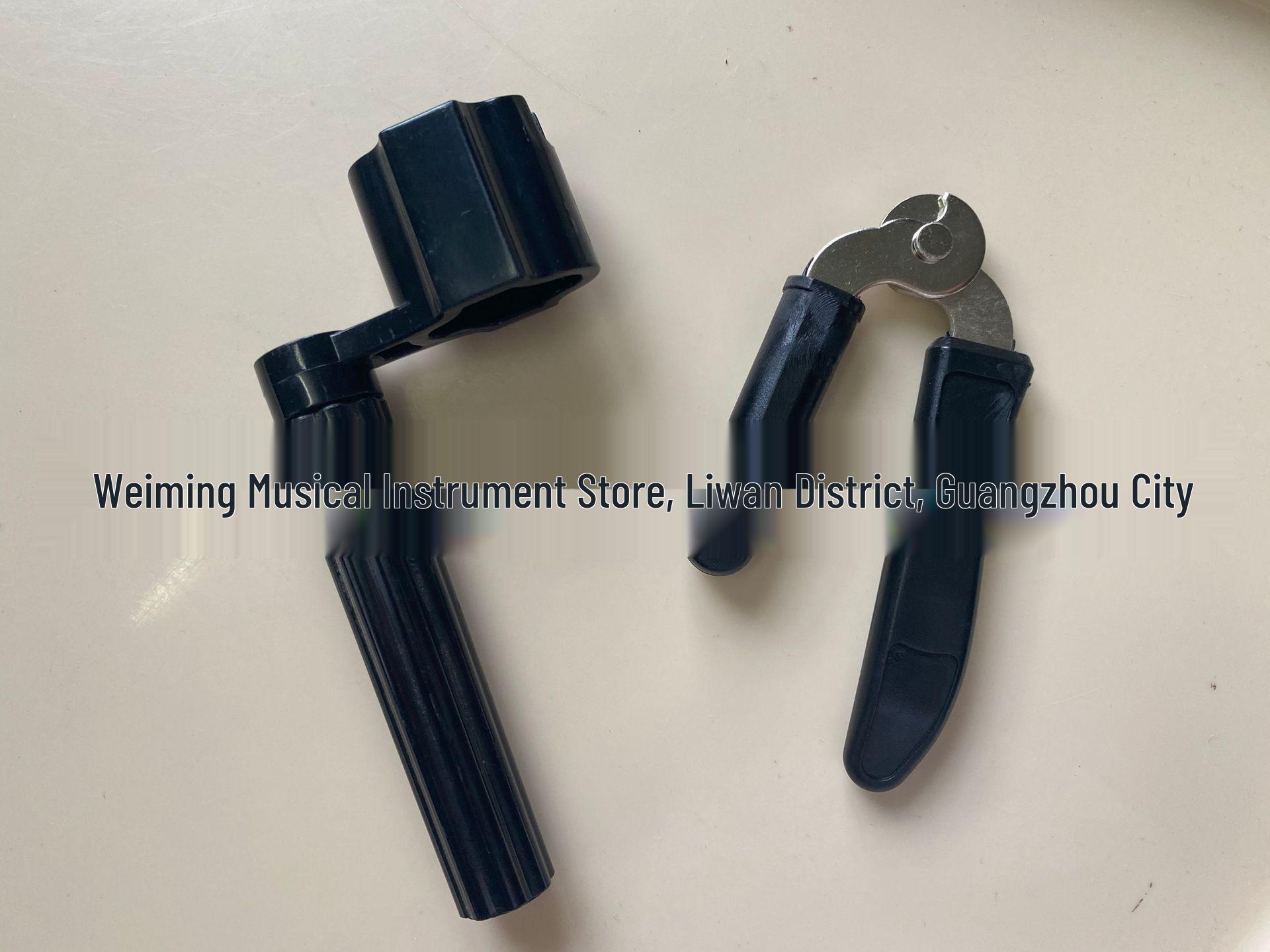 Bakelite Multi-Functional Guitar Tool: String Winder, Pin Puller, Pin Remover, and String Cutter.