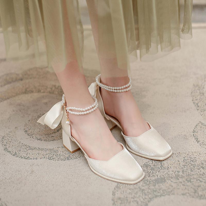 Baotou hollow sandals 2025 new summer square head high heels thick heel red wedding shoes pearl medium heel single shoes