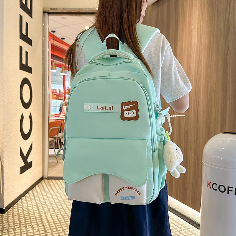 Large-capacity schoolbag female high-value junior high school student backpack Mori style cute small fresh multi-functional backpack