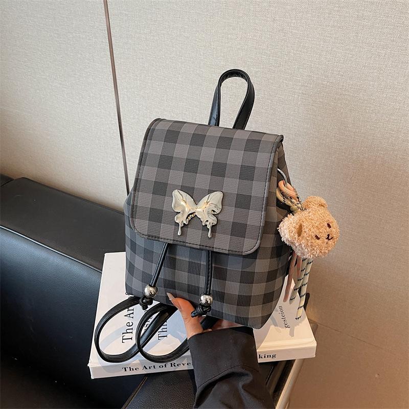 Plaid backpack female fashion niche student class schoolbag bucket bag high value travel small backpack