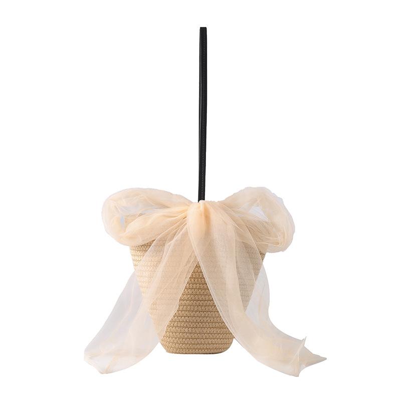 

New spring and summer fresh and fashionable straw bag bow cotton rope woven bag travel photography shoulder women s bag