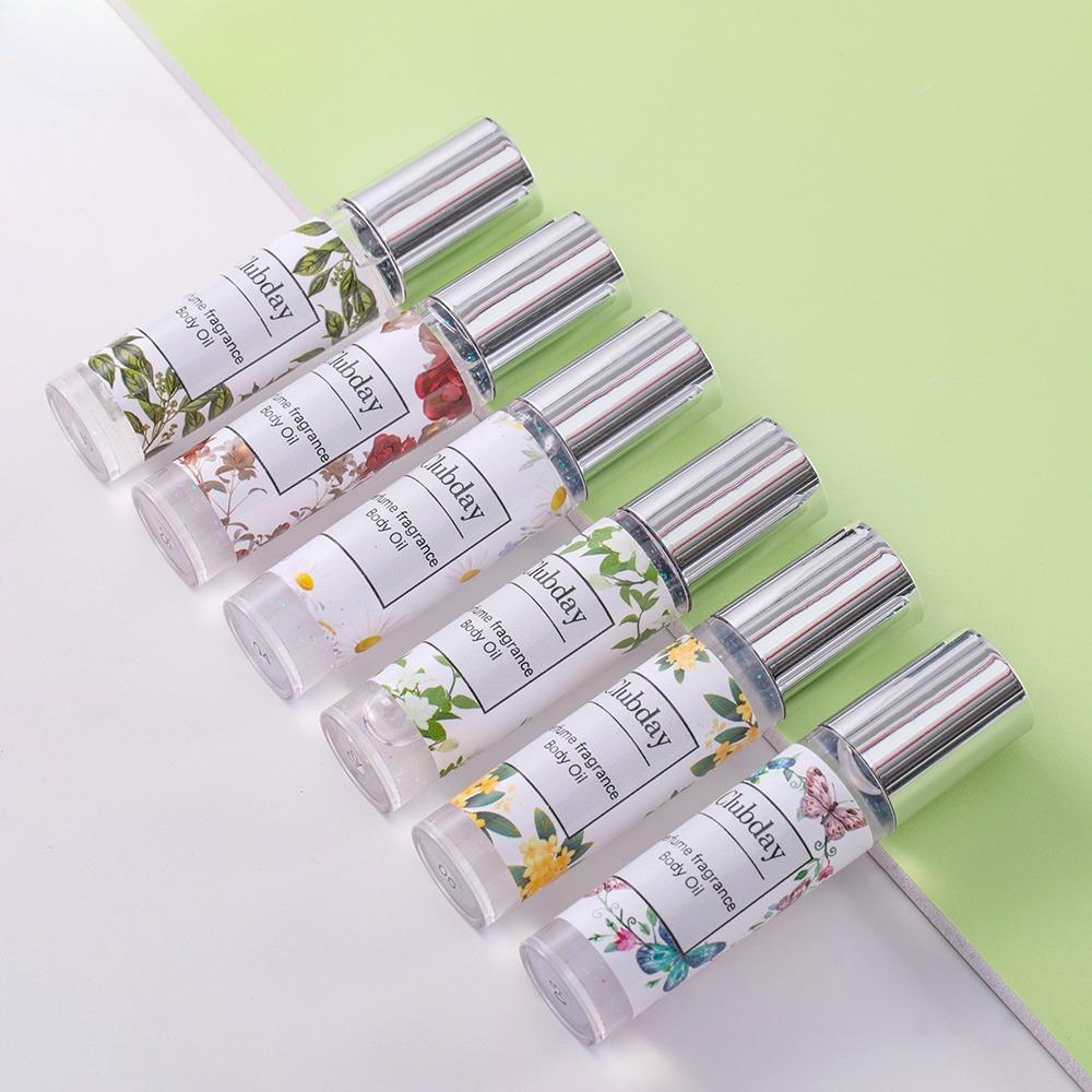 Long-lasting floral scent, moisturizing and fine shimmer. Brightening and highlighting body oil. Roll-on design for easy application