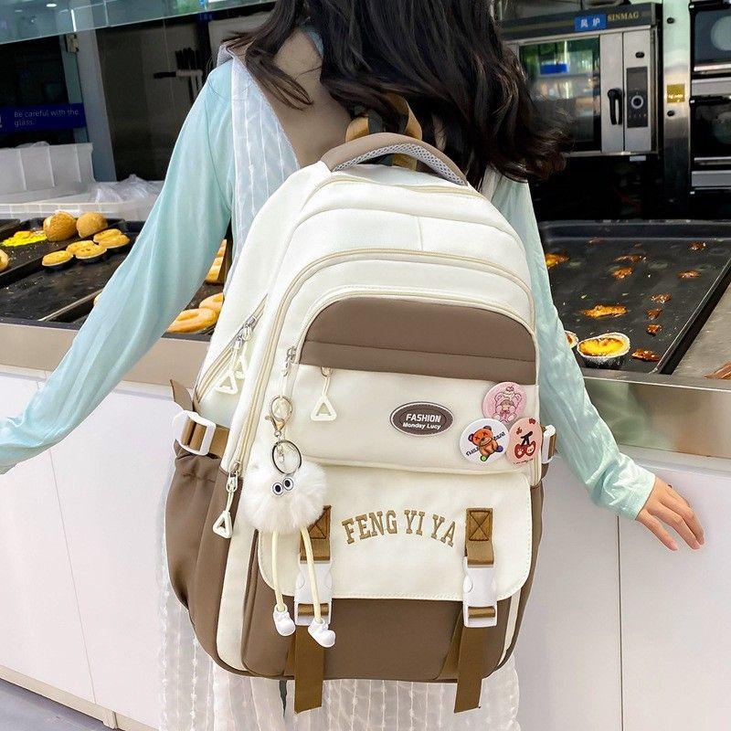 

Корейский стиль Преппи стиль Девочки-подростки Ученики средней школы 3-6 классы Большая вместимость Сверхлегкий Защита позвоночника Девочки Brown backpack + badge + pendant