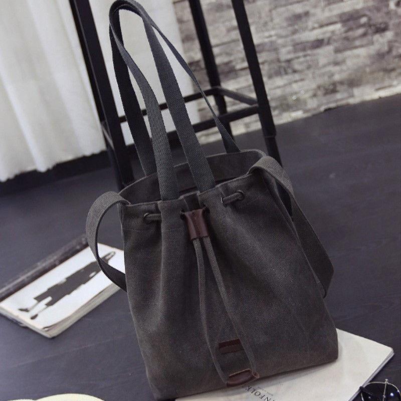 Elegant Women's Canvas Black Handbag With Adjustable Shoulder Strap And Soft Handle