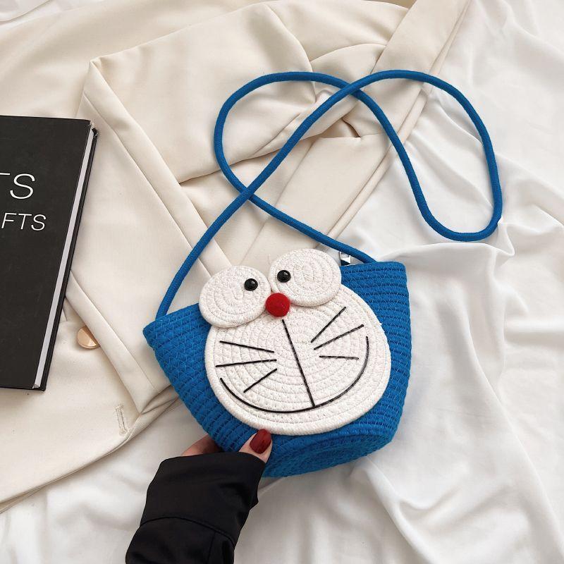

Cute Cartoon Doraemon Shoulder Cross Woven Bag Summer Bag Women 2025 New Ins Bucket Bag Niche синий